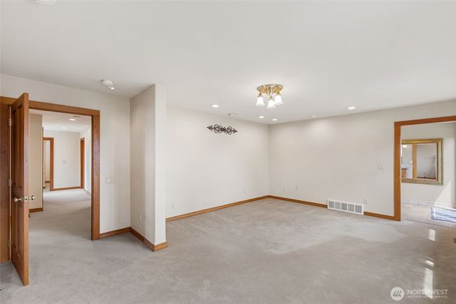 Primary bedroom with privacy wall. | Image 17