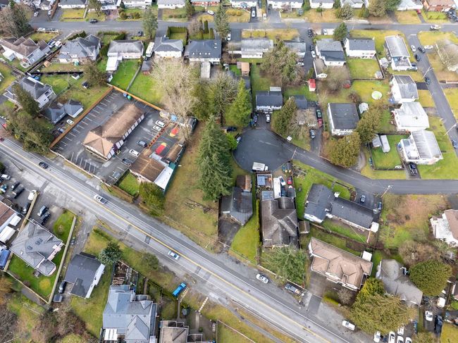 Aerial view of property and surrounding area with nearby suburban area | Image 9