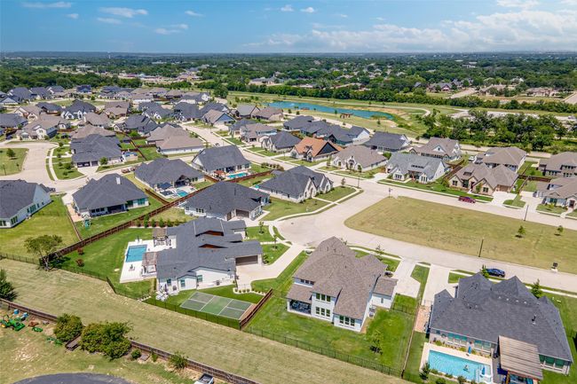 Large green space across the street and close to a pond and trails. | Image 38