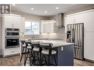 873 Dehart Rd, House other with 4 bedrooms, 3 bathrooms and 10 parking in Kelowna BC | Image 1