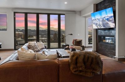 Living room with a fireplace and hardwood / wood-style floors | Image 3