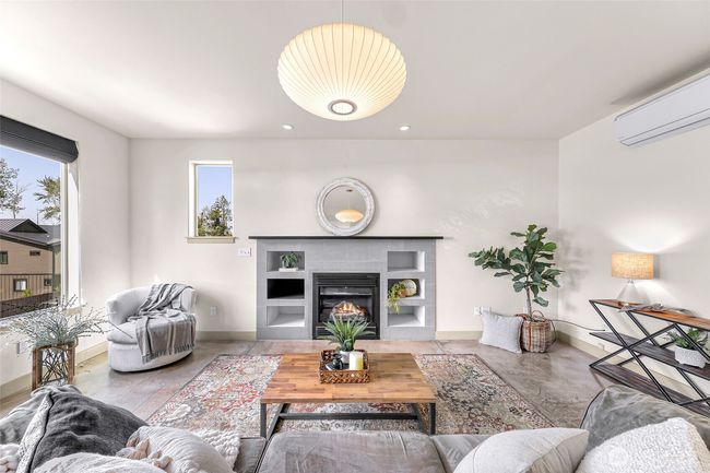 Beautiful has fireplace with built-in shelving, TV over the mantle, and wired for speakers in the ceiling. | Image 11