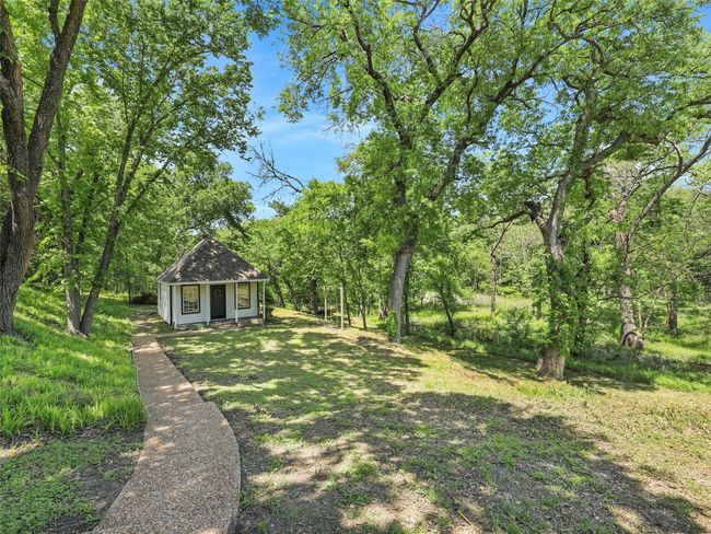 View of yard featuring an outbuilding | Image 30