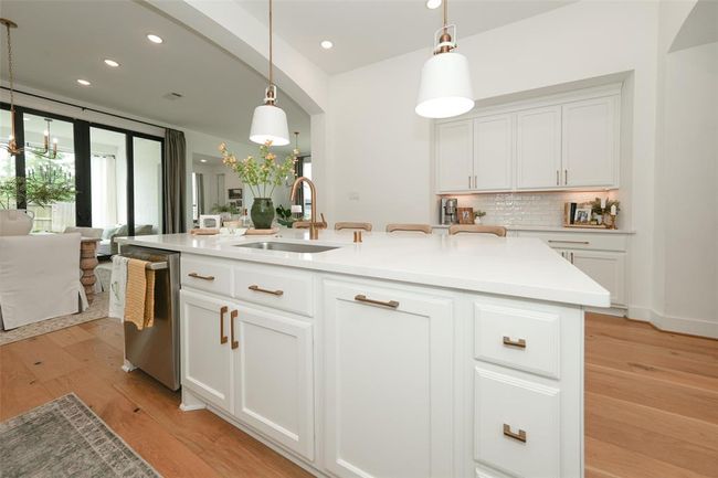 Elegant Moen sink and hardware enhance the kitchen's appeal. | Image 8
