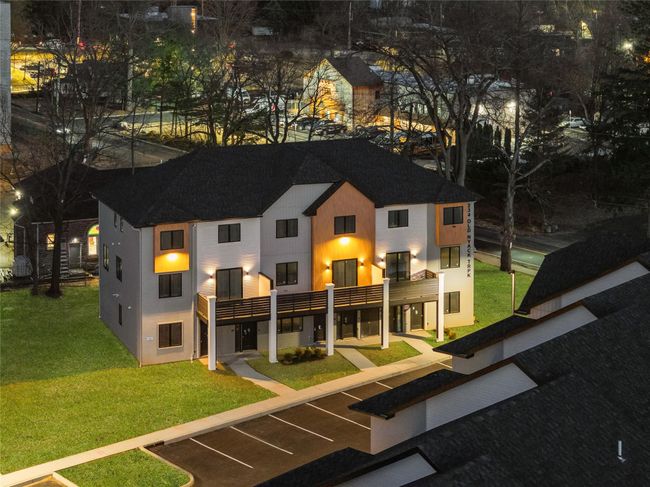 Back of property featuring a lawn and a shingled roof | Image 48