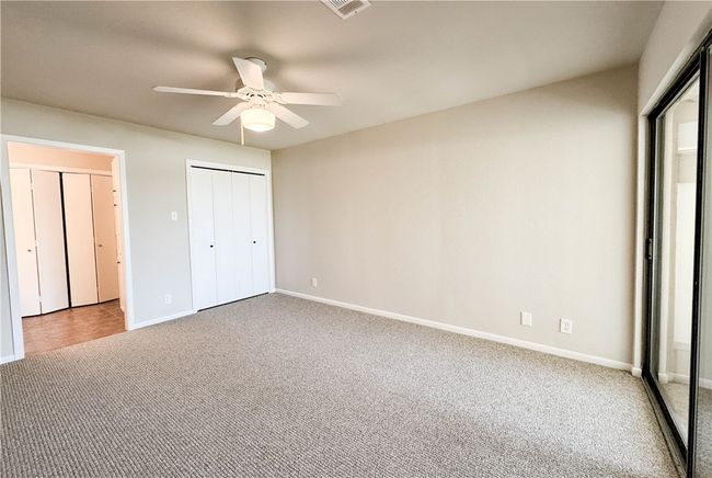 New carpet with access to private covered patio overlooking courtyard area | Image 12