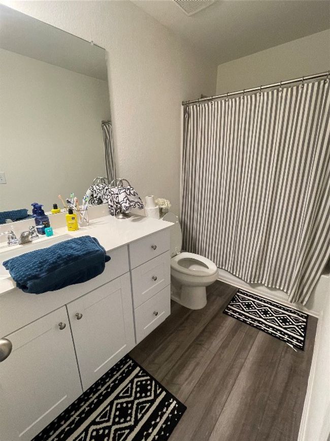 Bedroom 3 is located at the front of the home & has plenty of room for a queen sized bed. | Image 25