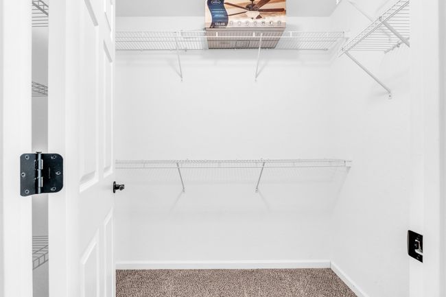 Large primary bedroom walk-in closet | Image 18