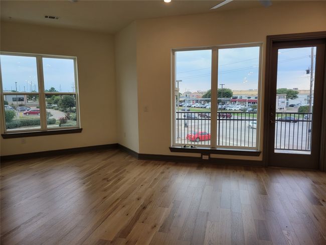 Unfurnished room featuring wood finished floors and recessed lighting | Image 5