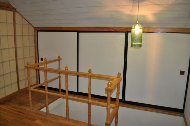 Upstairs bedroom featuring wood finished floors | Image 17