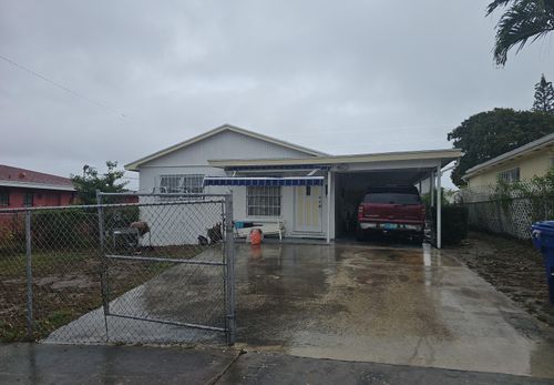 928 W 6th St, Riviera Beach, FL, 33404-7420 | Card Image