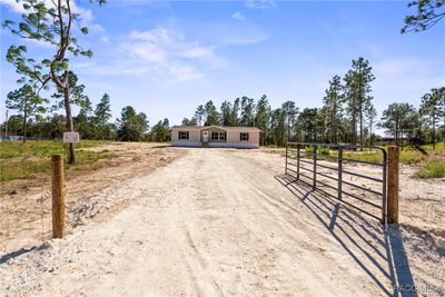 13090 Se 21 Place, House other with 3 bedrooms, 2 bathrooms and null parking in Morriston FL | Image 1