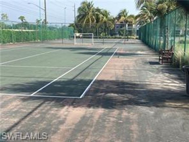 View of sport court featuring fence | Image 25