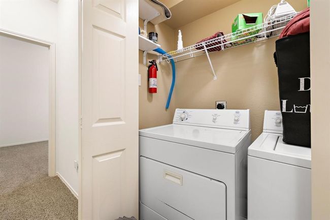 Enjoy the ease of an upstairs laundry closet, just steps away from bedrooms. | Image 12