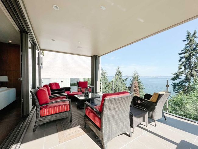 View of patio featuring an outdoor hangout area and a water view | Image 17