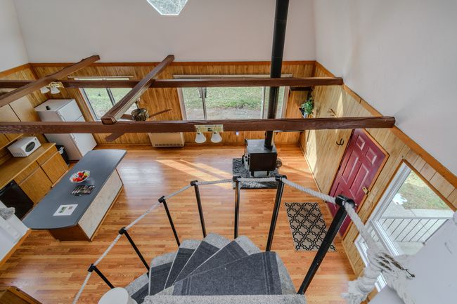 Stairs with wood walls, a healthy amount of sunlight, and hardwood / wood-style floors | Image 21