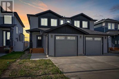 1421 Aldrich Pl, Home with 3 bedrooms, 3 bathrooms and 2 parking in Carstairs AB | Image 1