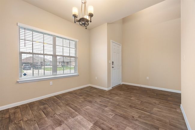 Formal dining or office space just inside front door. | Image 7