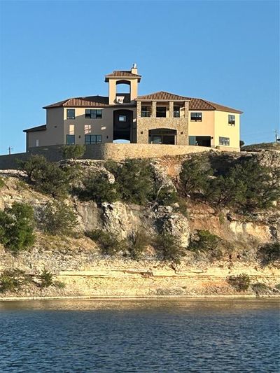 View of property featuring a water view | Image 1