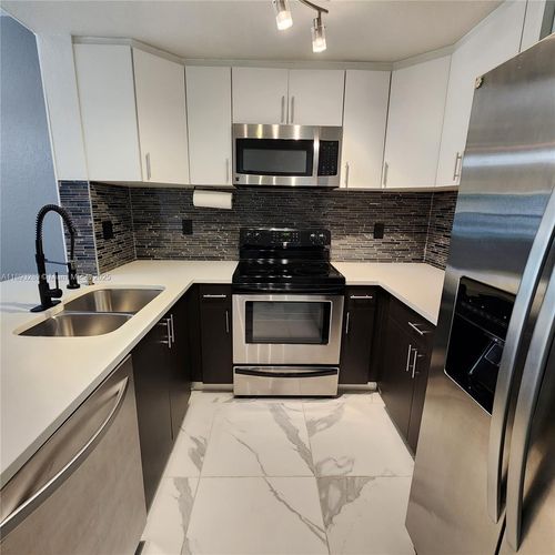 apt-102-2941 Riverside Dr, Coral Springs, FL, 33065-1023 | Card Image