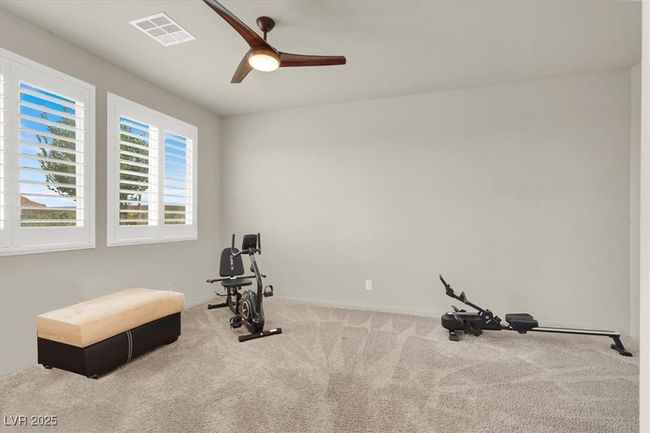 Exercise area featuring carpet and ceiling fan | Image 25