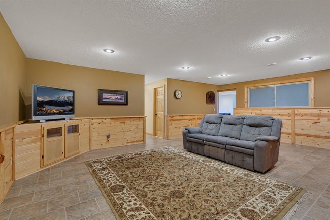Family room leading to the hallway and rec room | Image 24