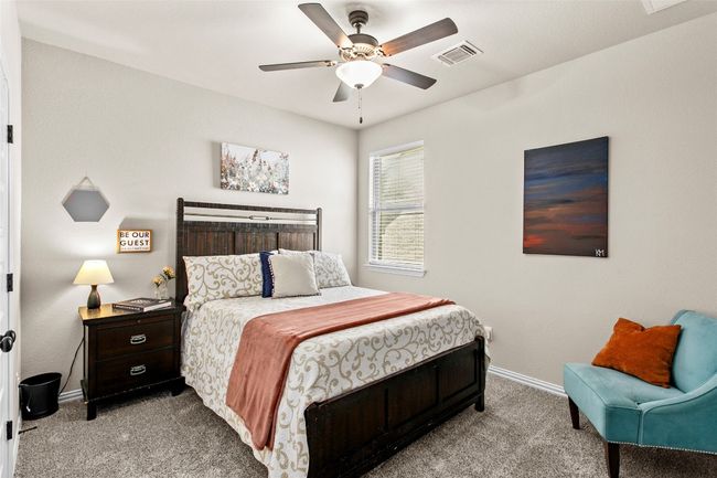 Carpeted bedroom featuring baseboards and ceiling fan | Image 21