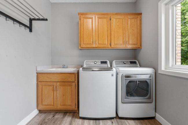 10605 Fernwood Ln N, House other with 5 bedrooms, 4 bathrooms and null parking in Champlin MN | Image 23