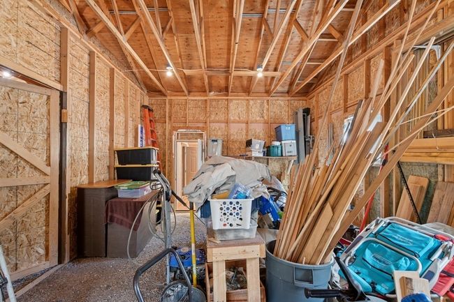Huge separate storage space in the back of the detached garage/workshop. | Image 27