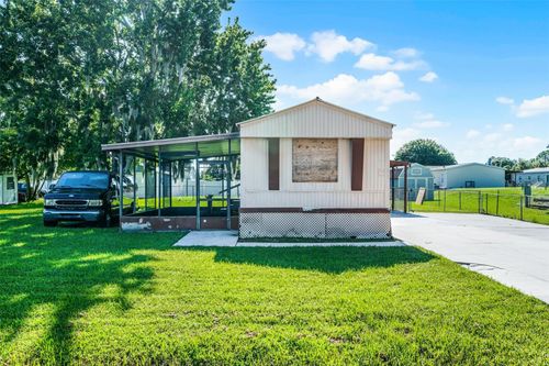 1043 Pineapple Way, Kissimmee, FL, 34741-6704 | Card Image