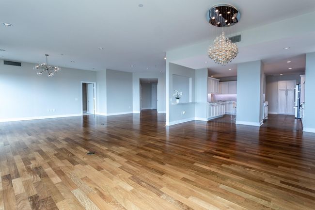 2 living areas, dining & open Kitchen. | Image 14