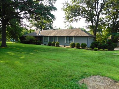 View of front of home with a front yard | Image 1