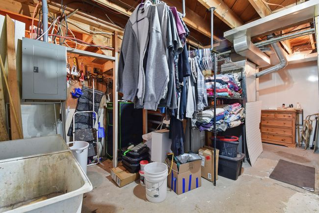 Unfinished below grade area with electric panel | Image 31