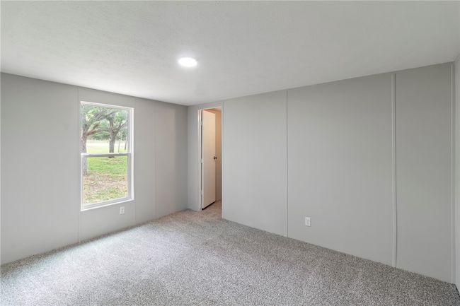 Empty room featuring carpet | Image 14