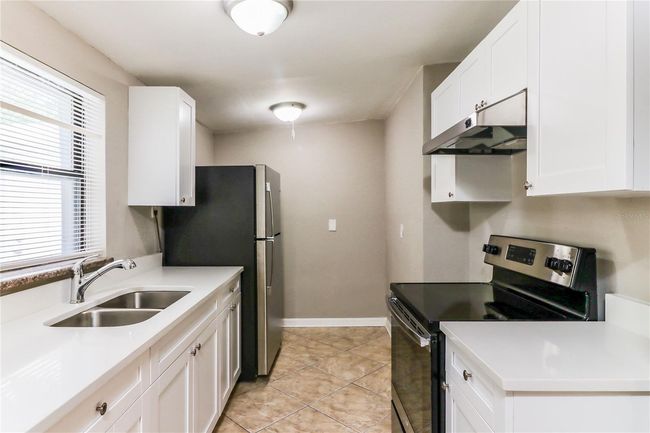 6819 Tuttle St, House other with 4 bedrooms, 3 bathrooms and null parking in TAMPA FL | Image 6