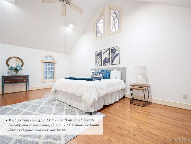 With soaring ceilings, a 13' x 17' walk-in closet, private balcony, and en-suite bath, this 23' x 15' primary bedroom delivers elegance and everyday luxury. | Image 26