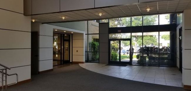 Lobby featuring a high ceiling | Image 8