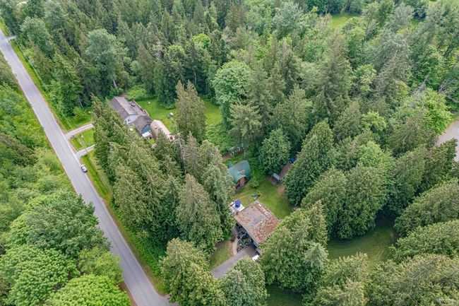 Aerial overview of property's location with a forest | Image 30