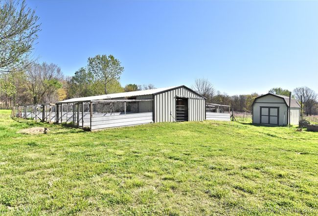 pens attached to the barn | Image 8
