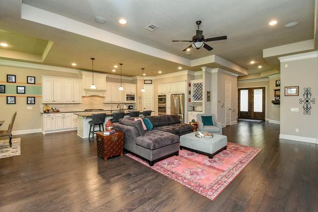 This open space makes furniture placement simple with most configurations. If you prefer a sofa and loveseat or recliners, you will love how well it all fits! | Image 15