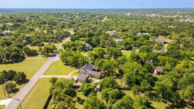 Brand new HEB off Nutty Brown & 290 plus the amenities of Belterra Village offer convenience while you retreat to your quiet hill country haven! | Image 34