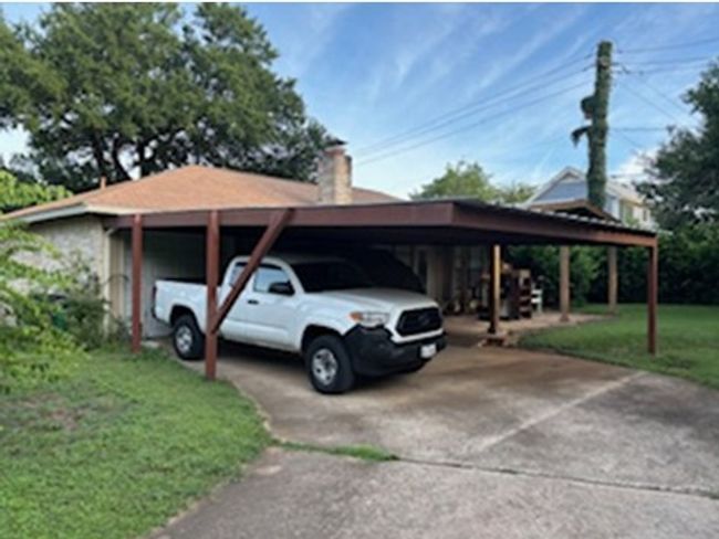 View of vehicle parking featuring driveway | Image 7