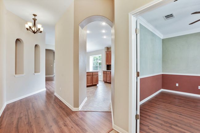 At the front of the home, a dedicated office provides the perfect space to work from home or pursue creative passions in peace. | Image 9