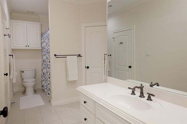 Each bedroom features an en-suite bath and walk-in closet | Image 30