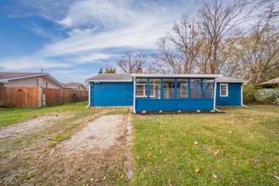 Front View of home including screened in patio. | Image 2