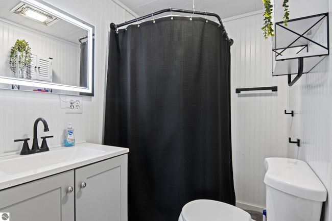 6015 Crystal Beach Rd Nw, House other with 4 bedrooms, 2 bathrooms and null parking in Rapid City MI | Image 22