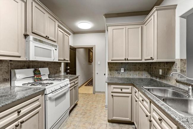 Guest quarters could also make this home an income generator for short or long term stays. | Image 43