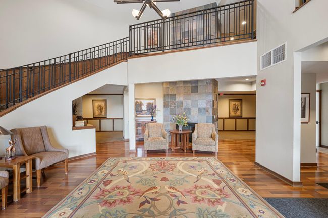 Welcome to Belvedere @ Chapelwood in the heart of Maple Grove, a vibrant +55 condominium community. Enjoy the community gym, library, party room, a car wash station, in unit laundry, manicured grounds, and well cared for common areas on every level. | Image 27