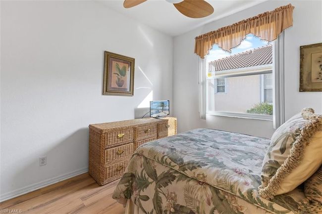Bedroom with ceiling fan and light hardwood / wood-style flooring | Image 20