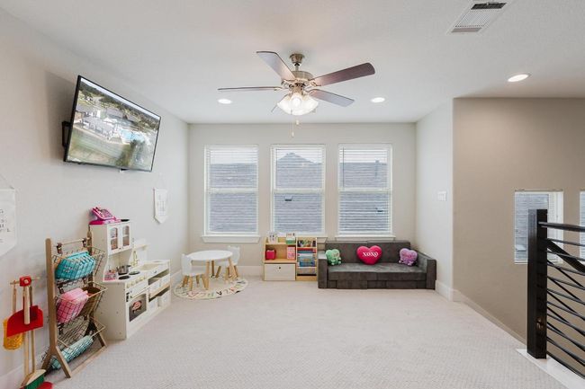 Second living area on second floor located at the base on stairs | Image 26